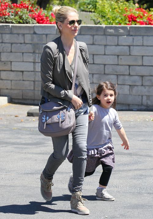 Czyją córeczką jest ta wesoła dziewczynka? (FOTO)