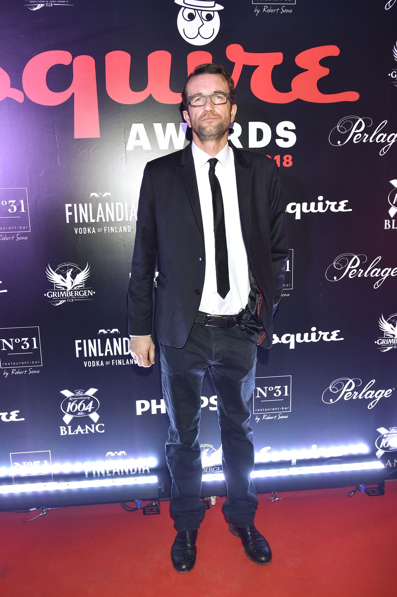 Tomasz Kot, Marcin Prokop, Kuba Przygoński ze statuetkami Esquire Awards