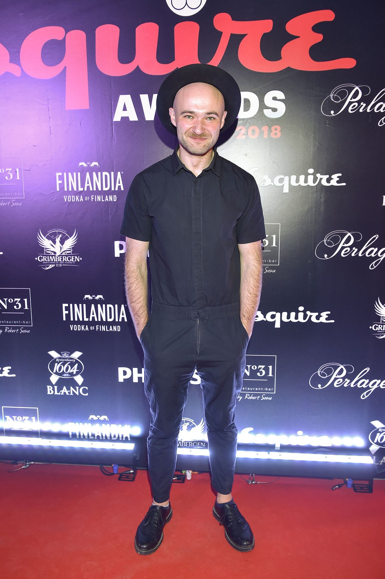 Tomasz Kot, Marcin Prokop, Kuba Przygoński ze statuetkami Esquire Awards