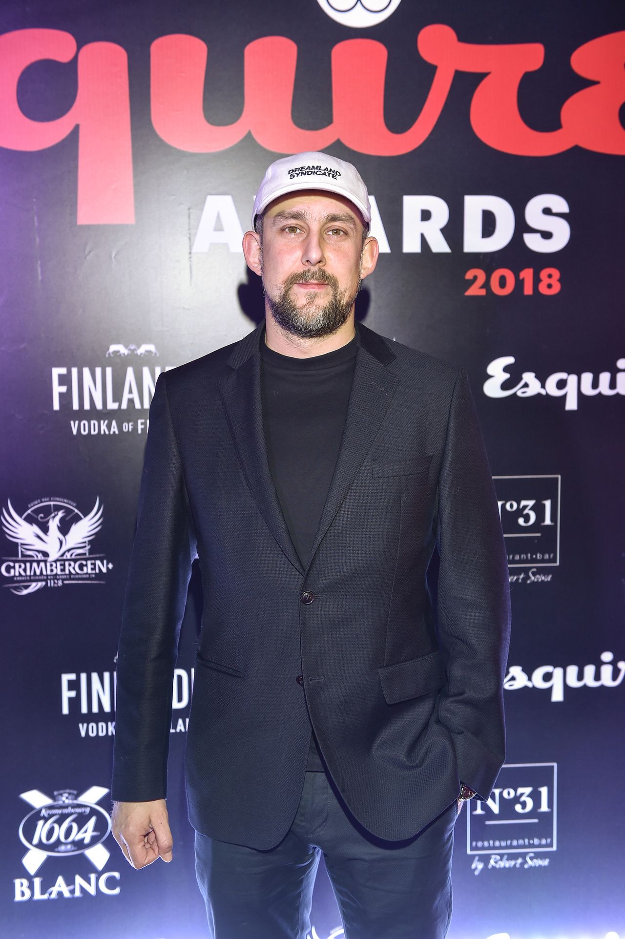 Tomasz Kot, Marcin Prokop, Kuba Przygoński ze statuetkami Esquire Awards