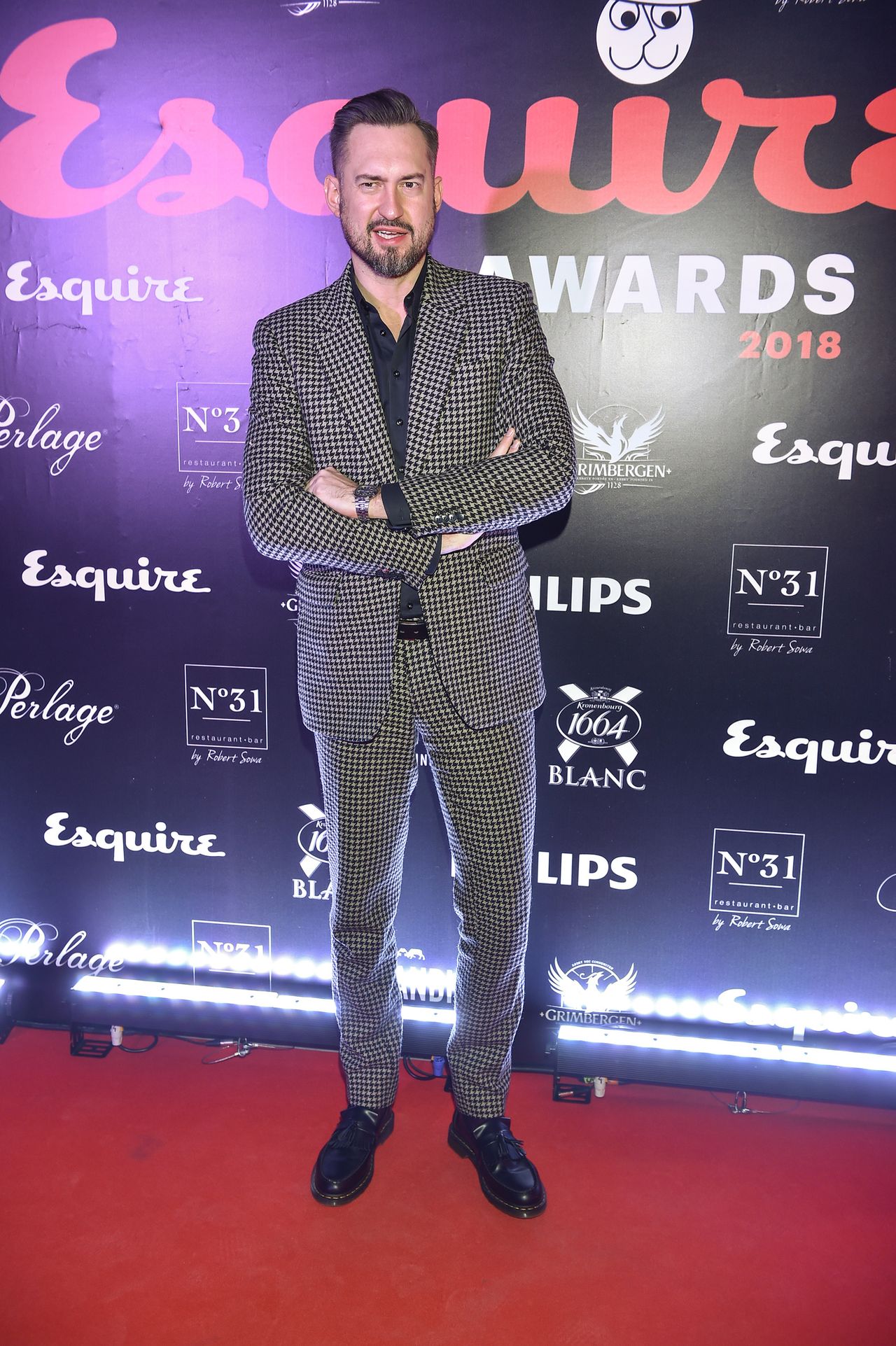 Tomasz Kot, Marcin Prokop, Kuba Przygoński ze statuetkami Esquire Awards