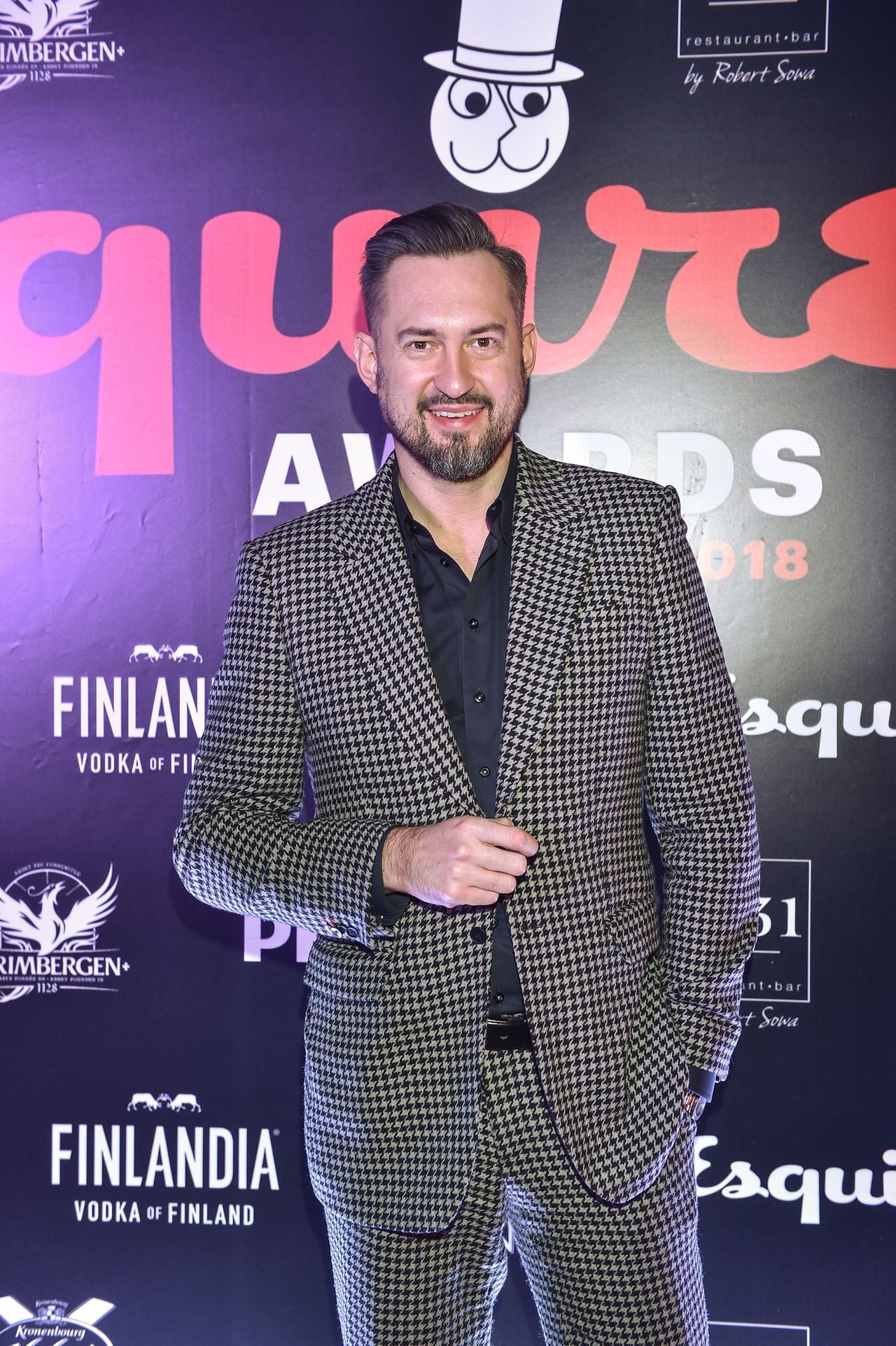 Tomasz Kot, Marcin Prokop, Kuba Przygoński ze statuetkami Esquire Awards