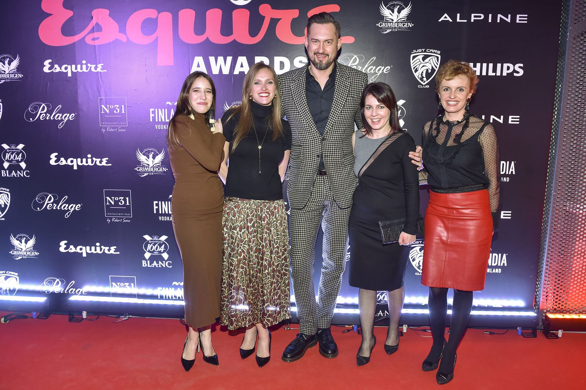 Tomasz Kot, Marcin Prokop, Kuba Przygoński ze statuetkami Esquire Awards