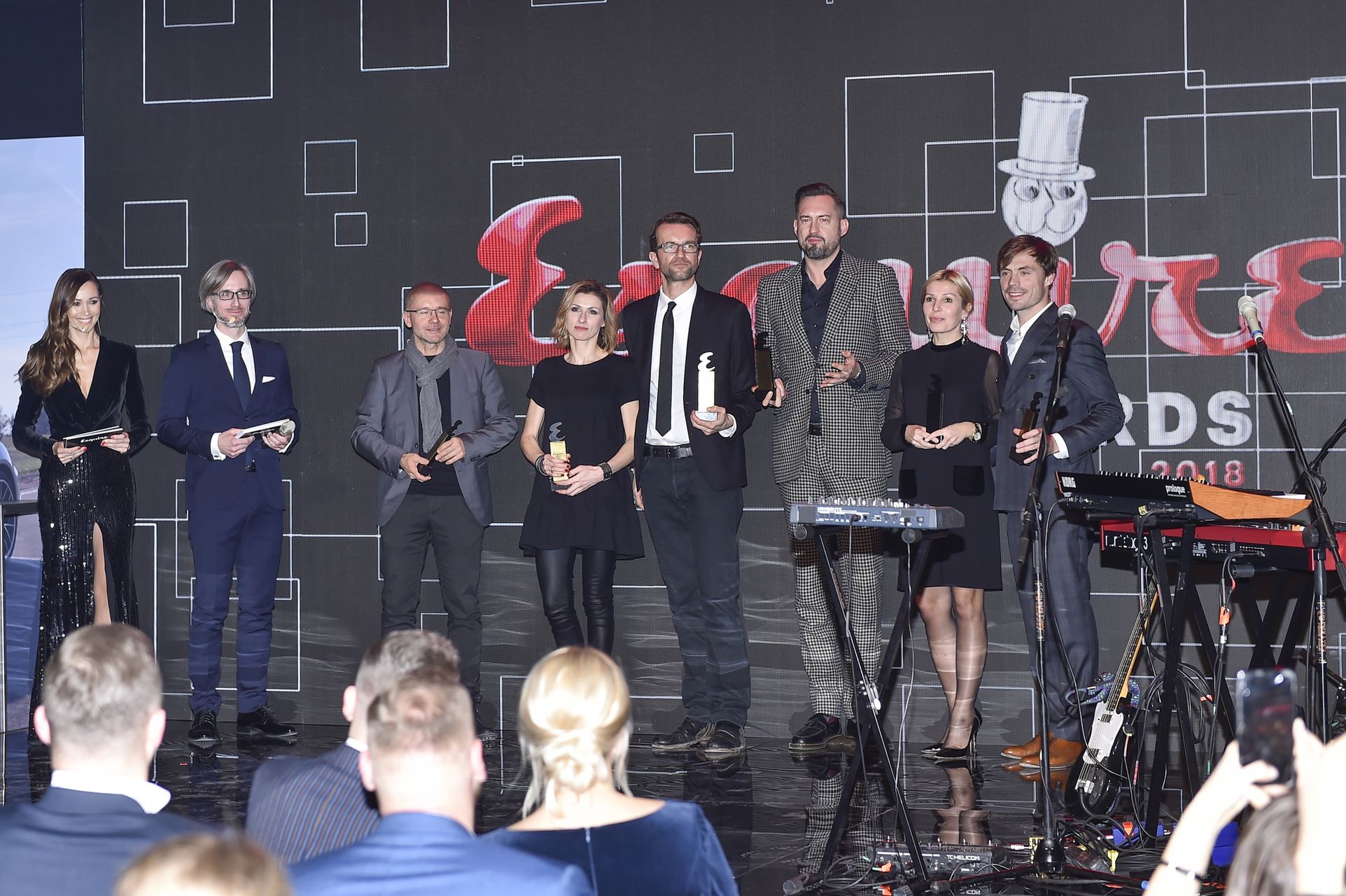 Tomasz Kot, Marcin Prokop, Kuba Przygoński ze statuetkami Esquire Awards