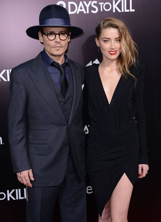Zakochani Johnny Depp i Amber Heard całują się na ściance 