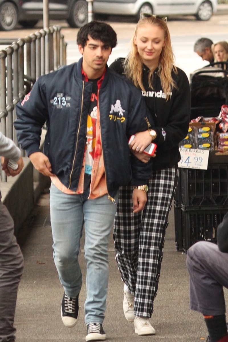 EXCLUSIVE: Joe Jonas and Sophie Turner share a kiss as they leave a Bondi cafe