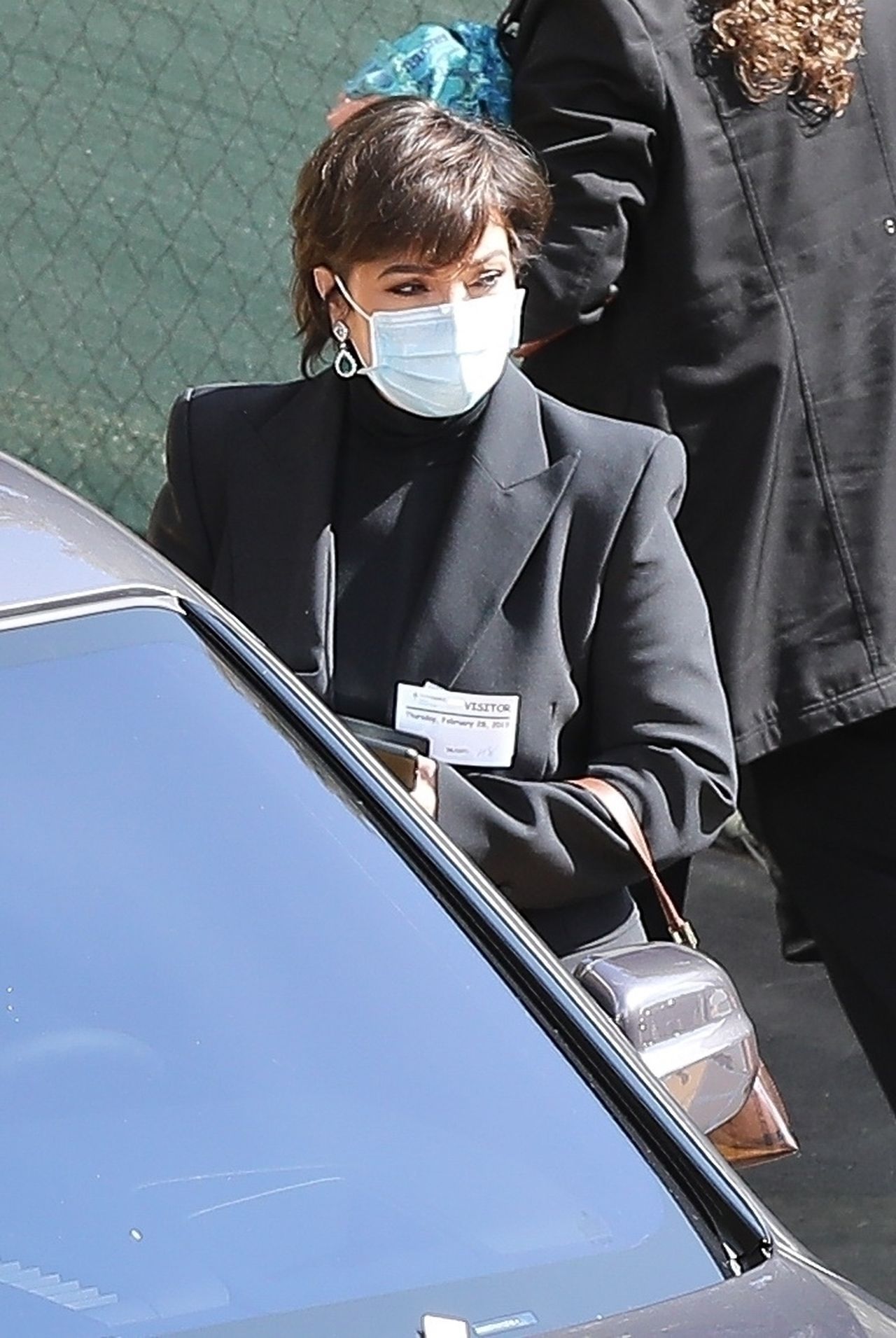 *EXCLUSIVE* Kris Jenner sports a surgical mask as she leaves the Providence Emergency Hospital with her mother