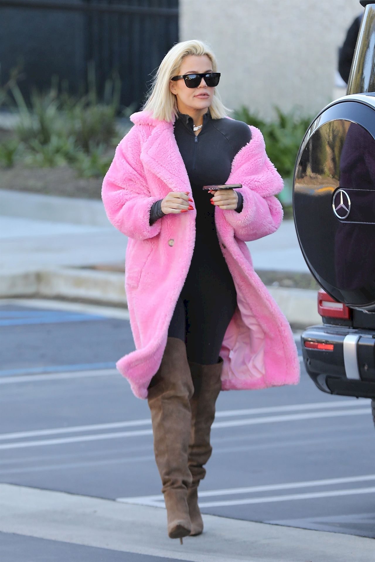 *EXCLUSIVE* Khloe Kardashian rocks a pink fur coat to Kanye's office in Calabasas Khloe Kardashian