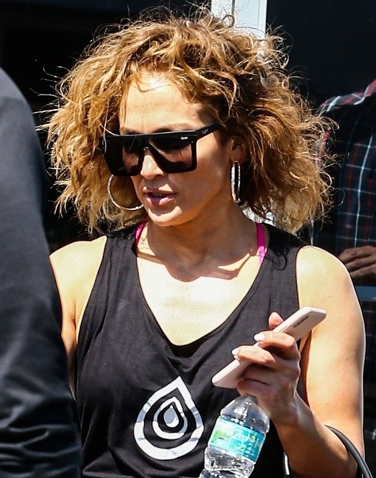 *EXCLUSIVE* Jennifer Lopez sports a curly new hairstyle while leaving the gym Jennifer Lopez