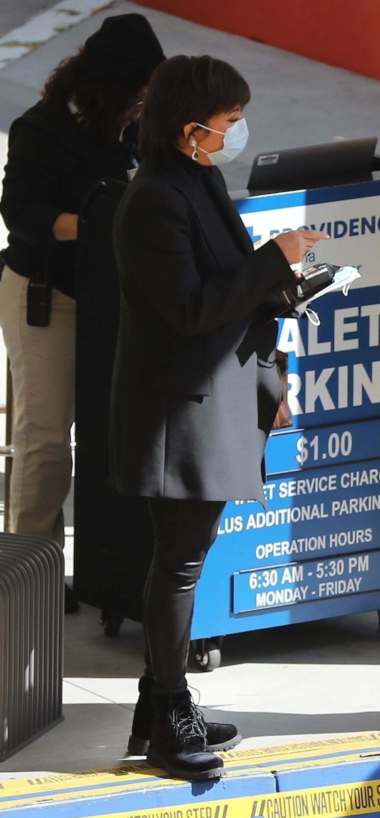 *EXCLUSIVE* Kris Jenner sports a surgical mask as she leaves the Providence Emergency Hospital with her mother