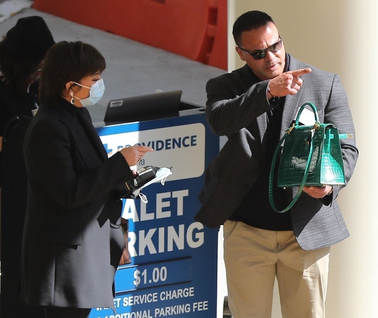 *EXCLUSIVE* Kris Jenner sports a surgical mask as she leaves the Providence Emergency Hospital with her mother