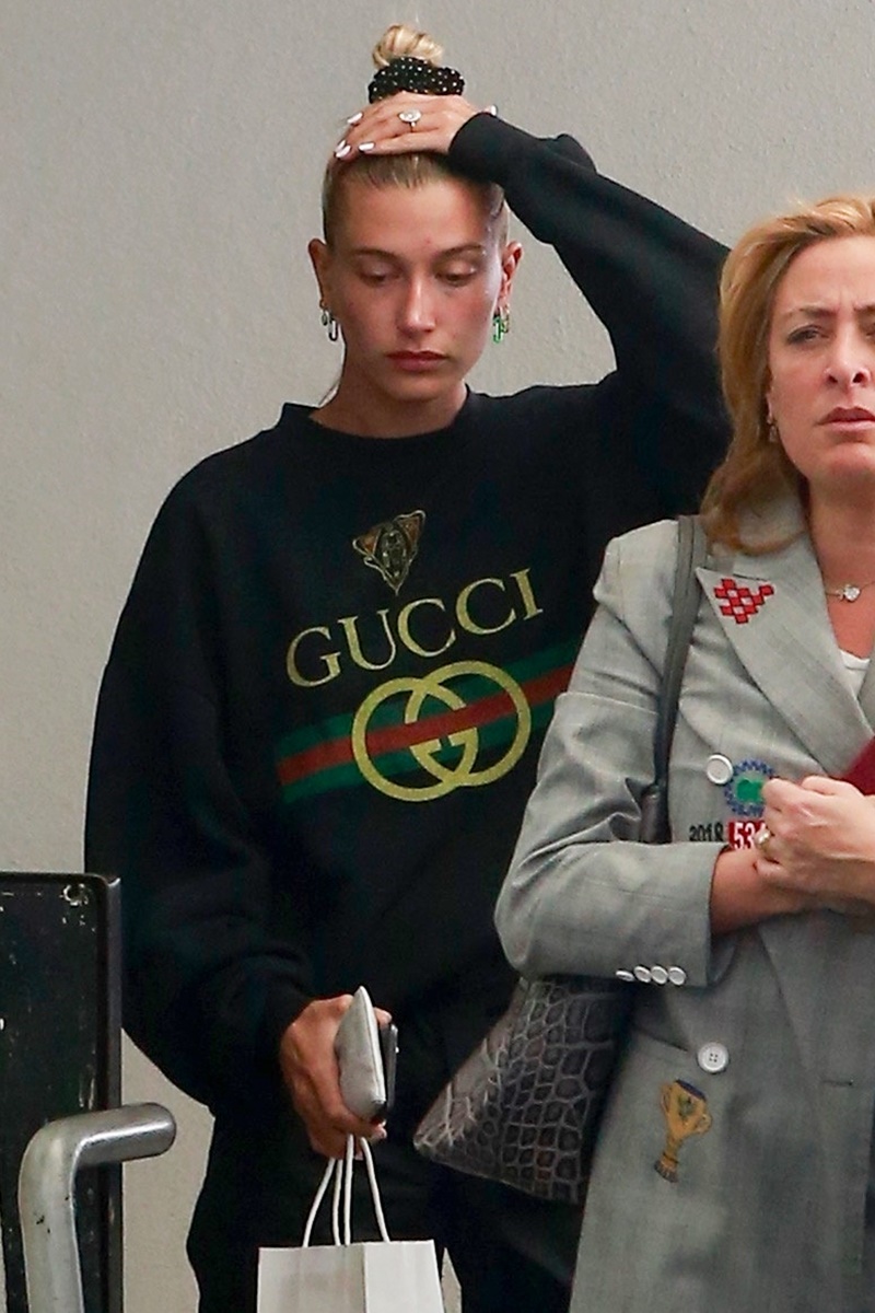 *EXCLUSIVE* Hailey Bieber covers her forehead after a visit to a dermatologist Hailey Bieber