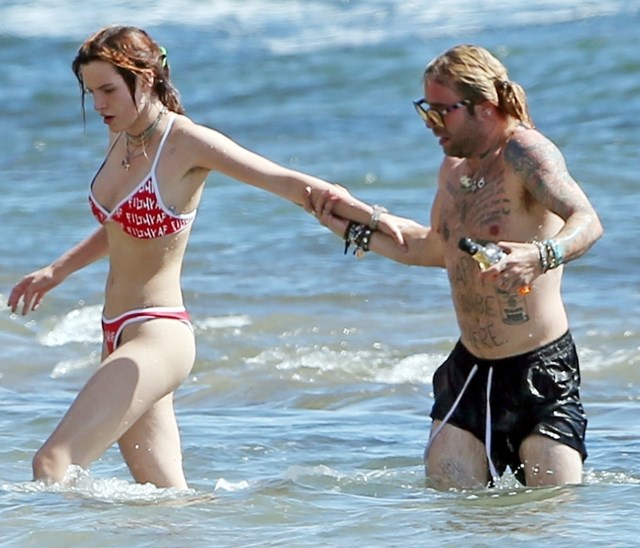 *EXCLUSIVE* Bella Thorne suffers a bikini malfunction on a swim in Maui Bella Thorne, Mod Sun