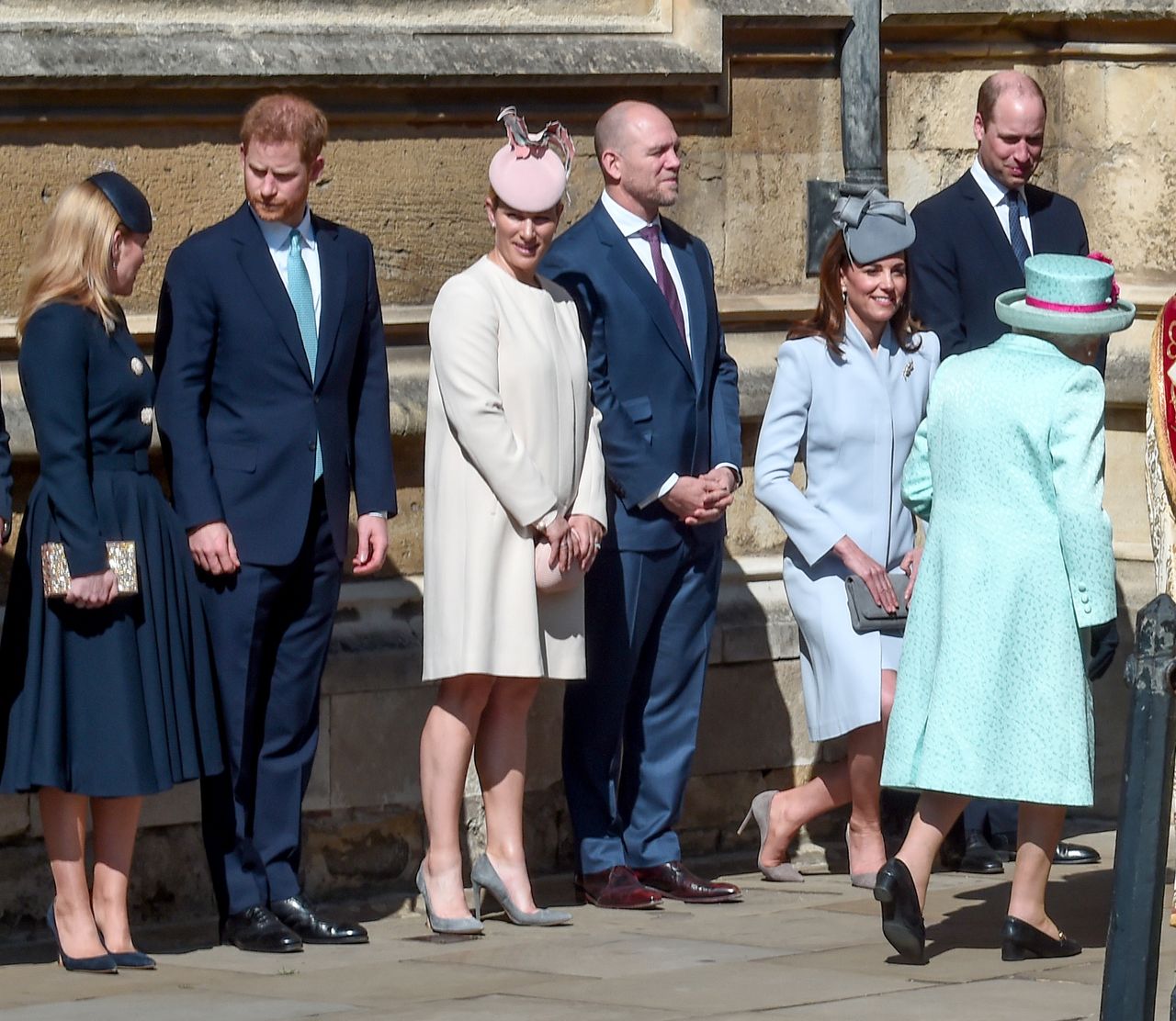Members of the Royal Family greet Queen Elizabeth II as she arrives to attend the Easter Mattins Service at St. George's Chapel, at Windsor Castle