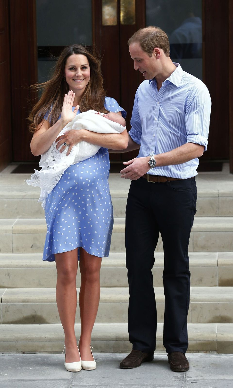 File photograph of Britain's Prince William and his wife Catherine, Duchess of Cambridge with their baby son, outside the Lindo Wing of St Mary's Hospital, in central London