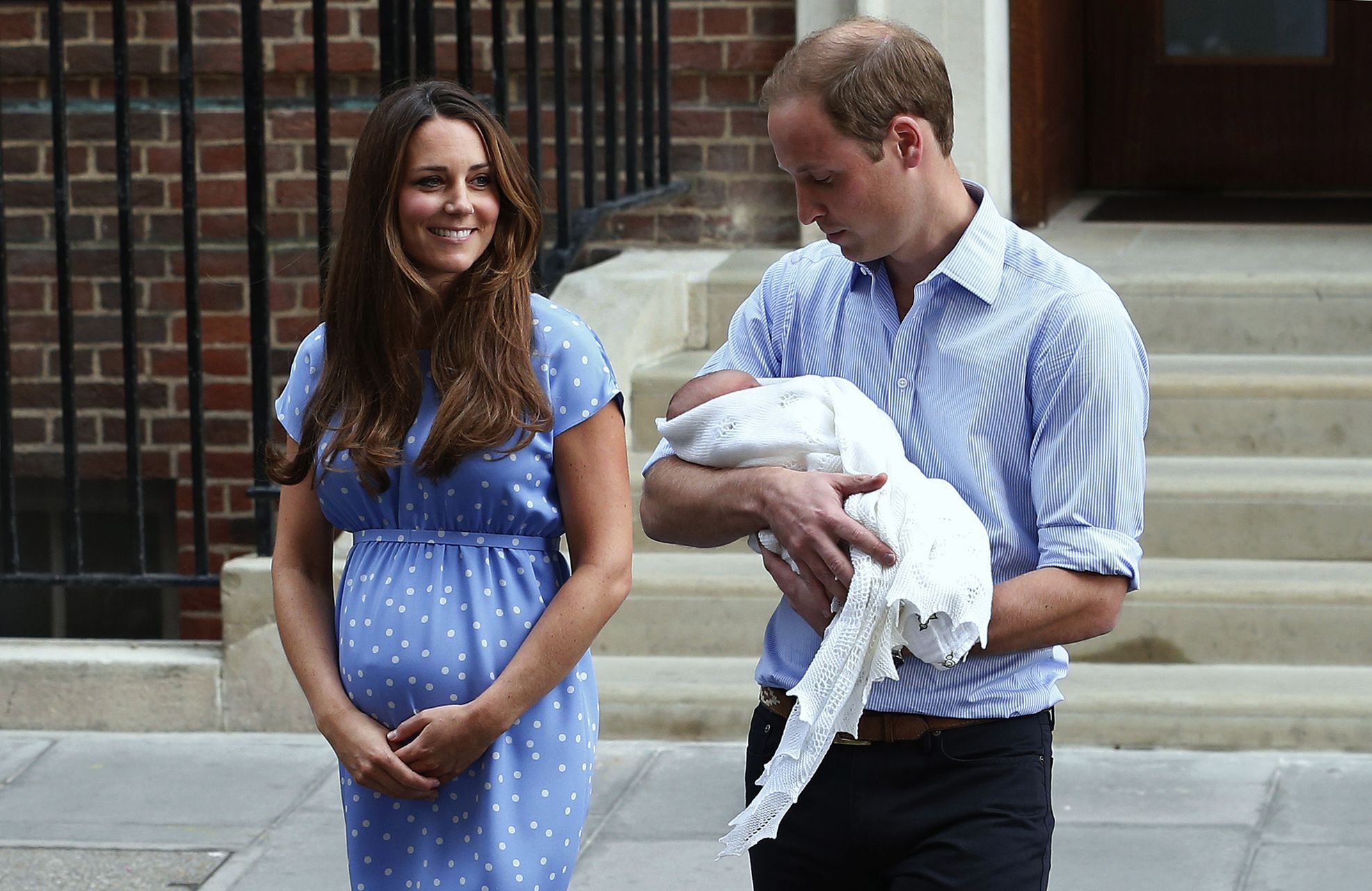 File photograph of Britain's Prince William and his wife Catherine, Duchess of Cambridge with their baby son George outside St Mary's Hospital, in central London