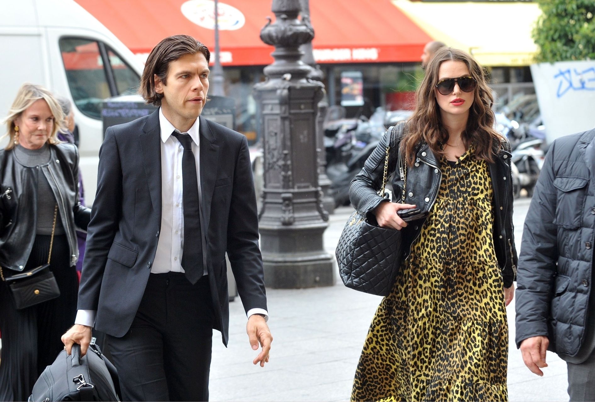 Pregnant British actress Keira Knightley pictured with husband James Righton in Paris.