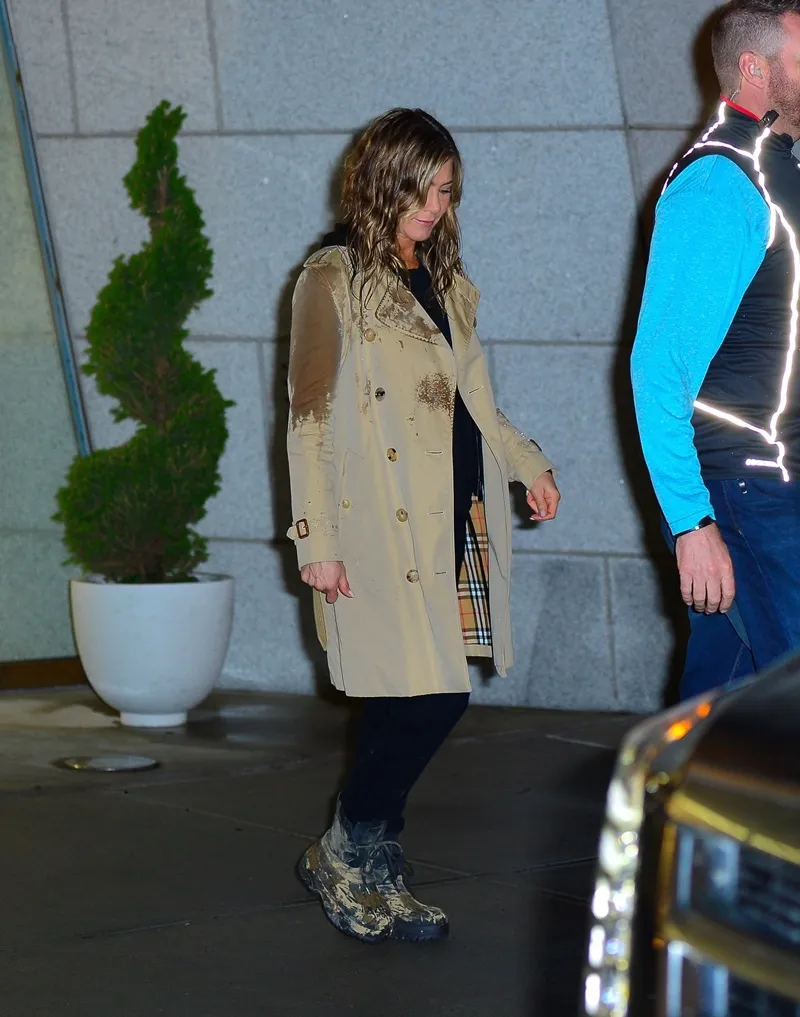 Jennifer Aniston stuns in a Burberry jacket and boots during late night shoot for her upcoming movie Jennifer Aniston