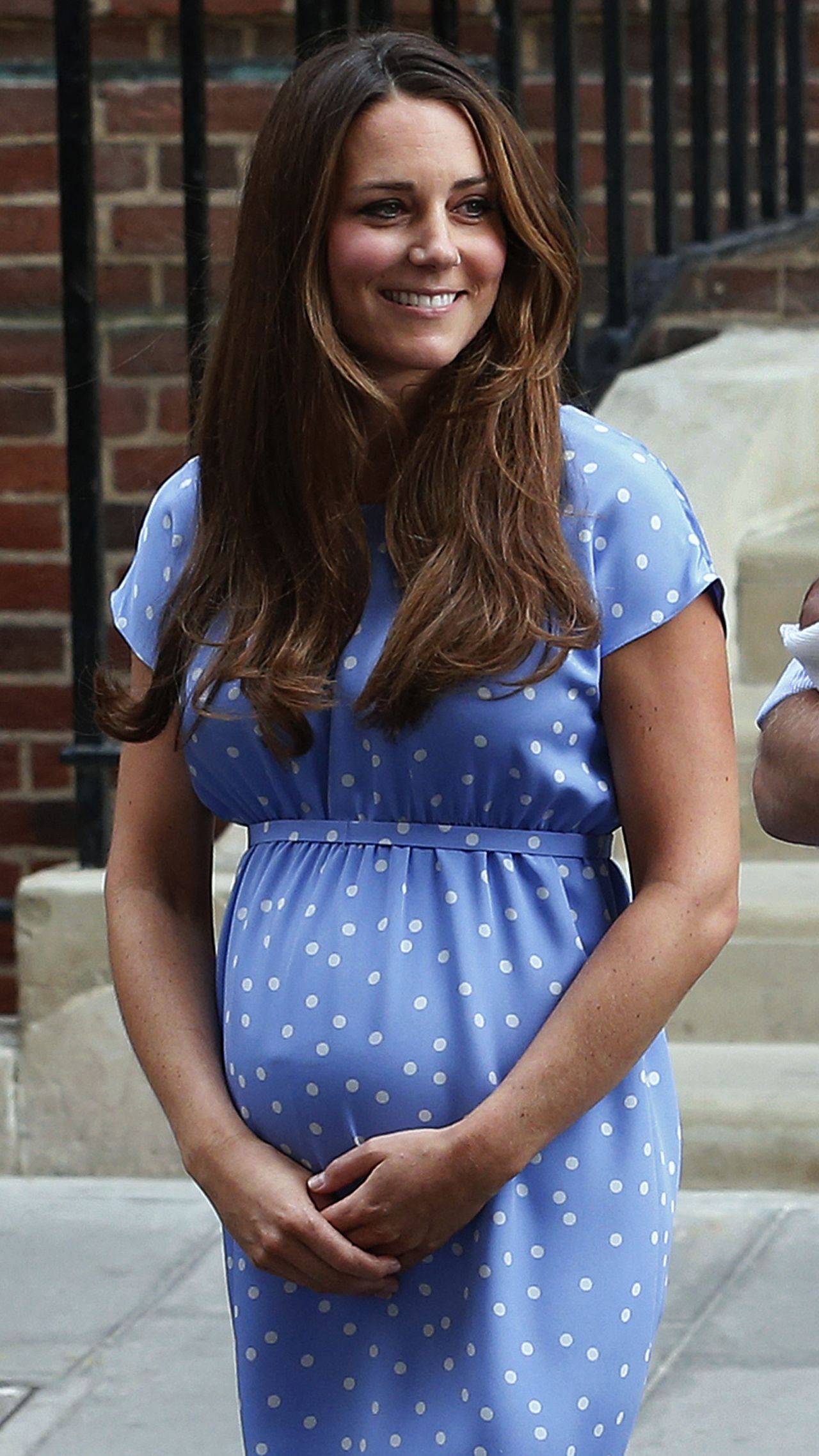 File photograph of Britain's Prince William and his wife Catherine, Duchess of Cambridge with their baby son George outside St Mary's Hospital, in central London