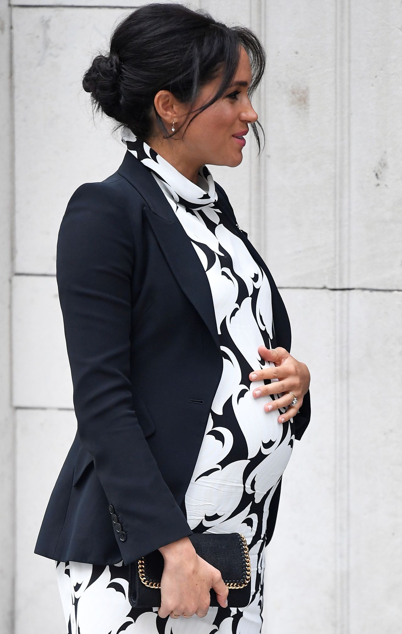 Britain's Meghan, Duchess of Sussex, leaves after an International Women's Day panel discussion at King's College London