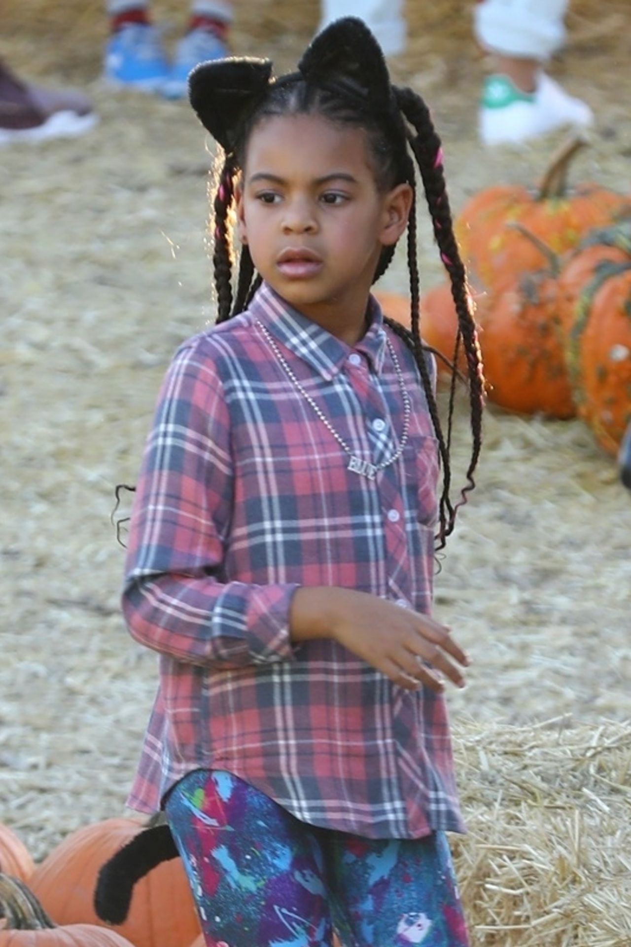 *EXCLUSIVE* Blue Ivy Carter enjoys a pony ride at the pumpkin patch with friends