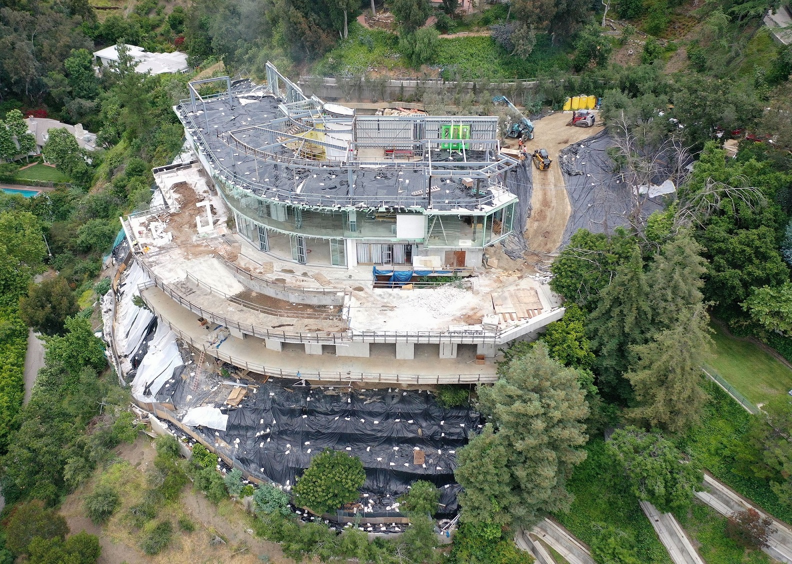 EXCLUSIVE: Mohamed Hadid starts to tear down his Bel Air mega Mansion!