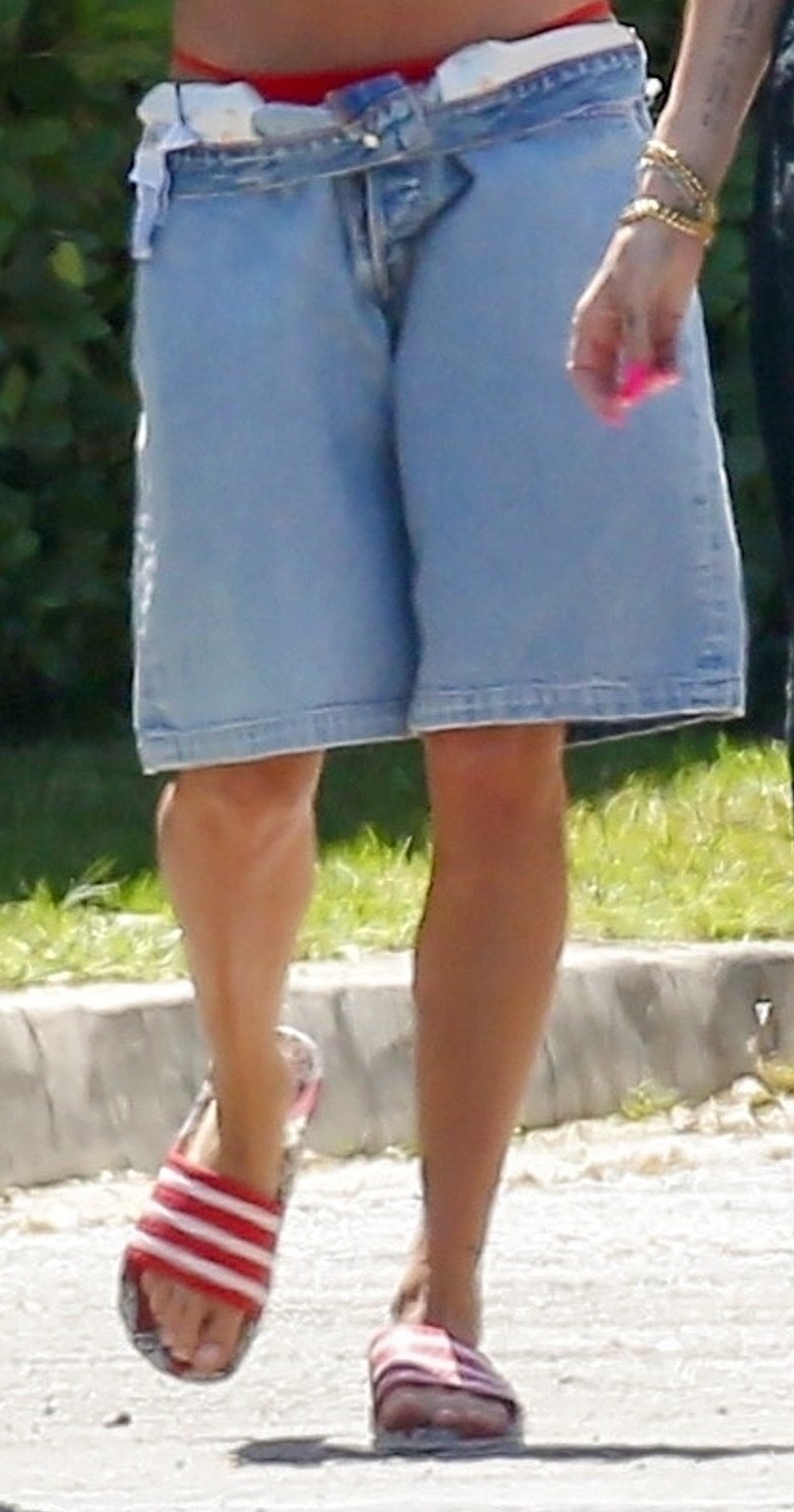 *EXCLUSIVE* It's summertime for the Biebers! Hailey puts her trimmed waist on display while enjoying the heat with hubby Justin