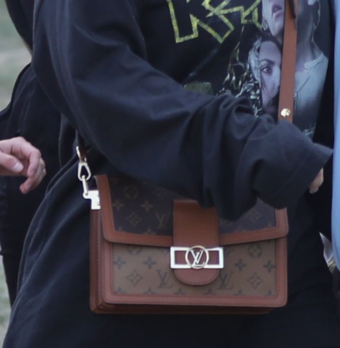 Adele holds hands with a male friend en route to watch Celine Dion in Hyde Park, London.