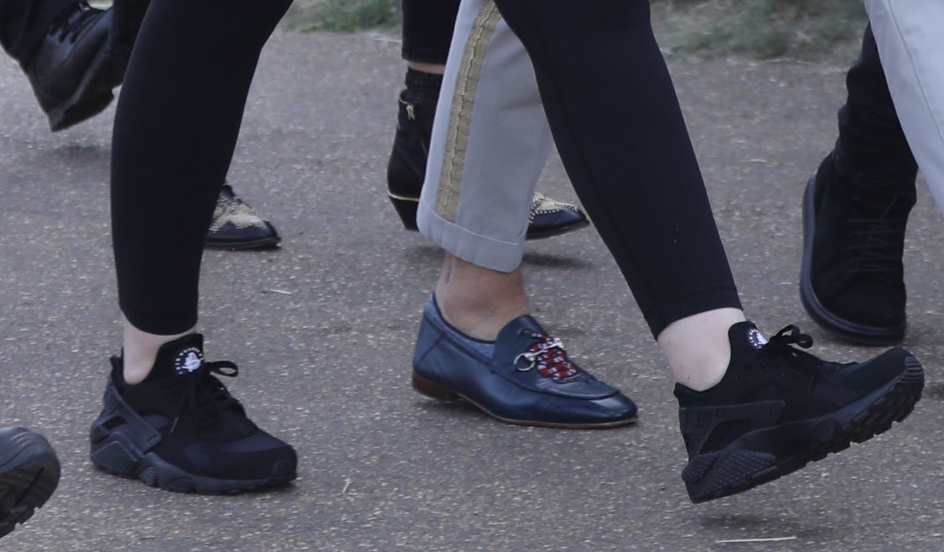 Adele holds hands with a male friend en route to watch Celine Dion in Hyde Park, London.