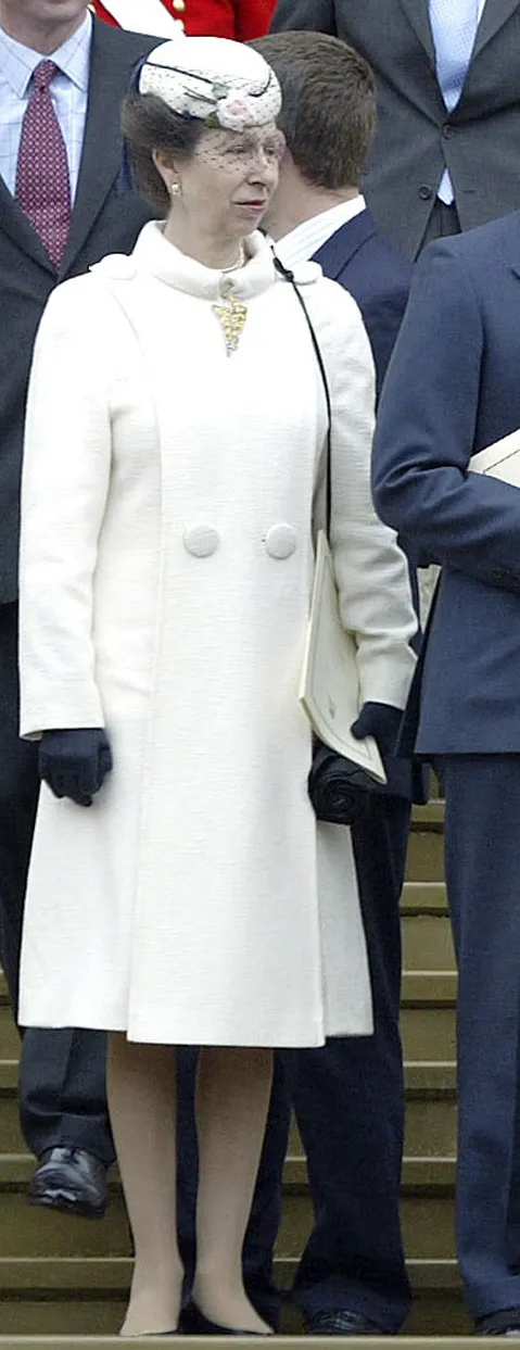Britain's Queen Elizabeth II stands on steps of St George's Chapel following service in Windsor Britain's Queen Elizabeth II stands on steps of St George's Chapel following service in Windsor