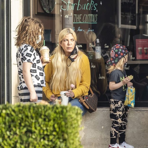 *EXCLUSIVE* Tori Spelling and Dean McDermott brave COVID-19, taking the entire family out to Starbucks