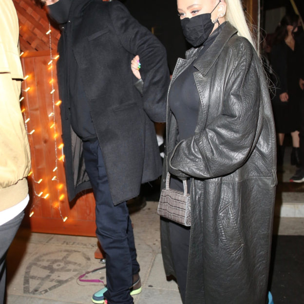 Christina Aguilera holds onto her boyfriend Matthew Rutler while leaving his birthday celebration!