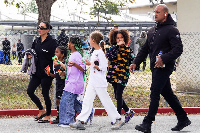 PREMIUM EXCLUSIVE: *MINIMUM FEE TO BE AGREED* Kanye West waves goodbye to ex-wife Kim Kardashian and his kids after attending Saint's soccer game. Kim kept a straight face as Kanye left separately and she walked with daughter North and son Saint