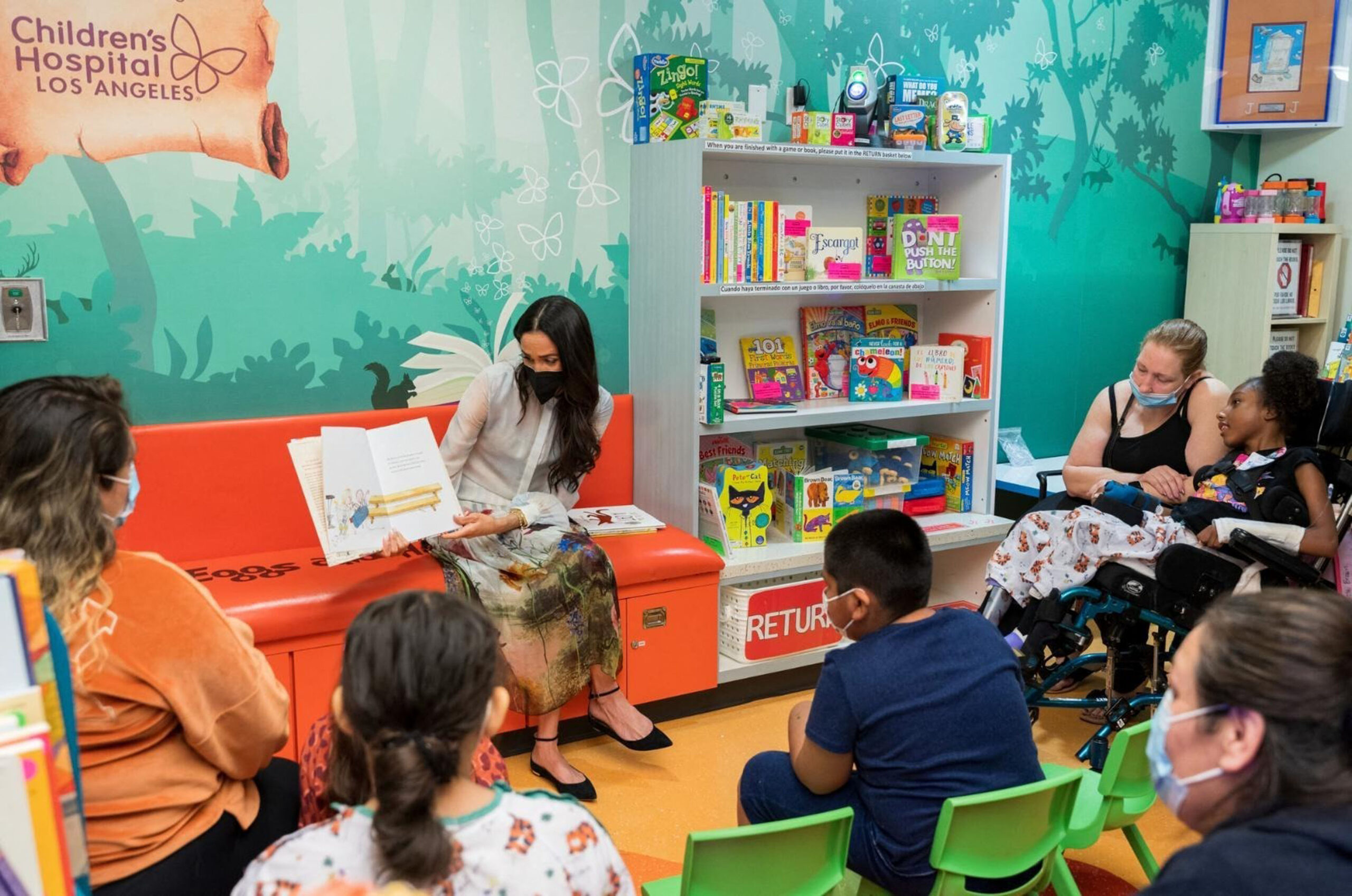 Meghan Markle reads to youngsters at Children’s Hospital Los Angeles during a visit on March 21