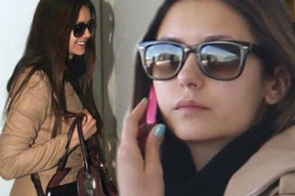 Nina Dobrev w beżowym płaszczu