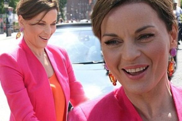 Małgorzata Foremniak w pomarańczowej sukience