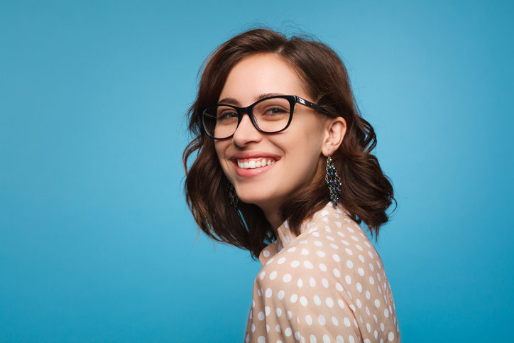Smiling woman posing in glasses